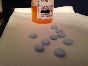 Alprazolam pills and prescription bottle